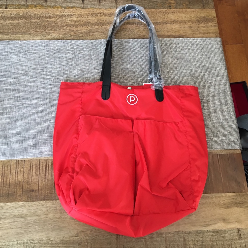 Pure Barre Tote Bag. Two small tears inside not noticeable from the outside.